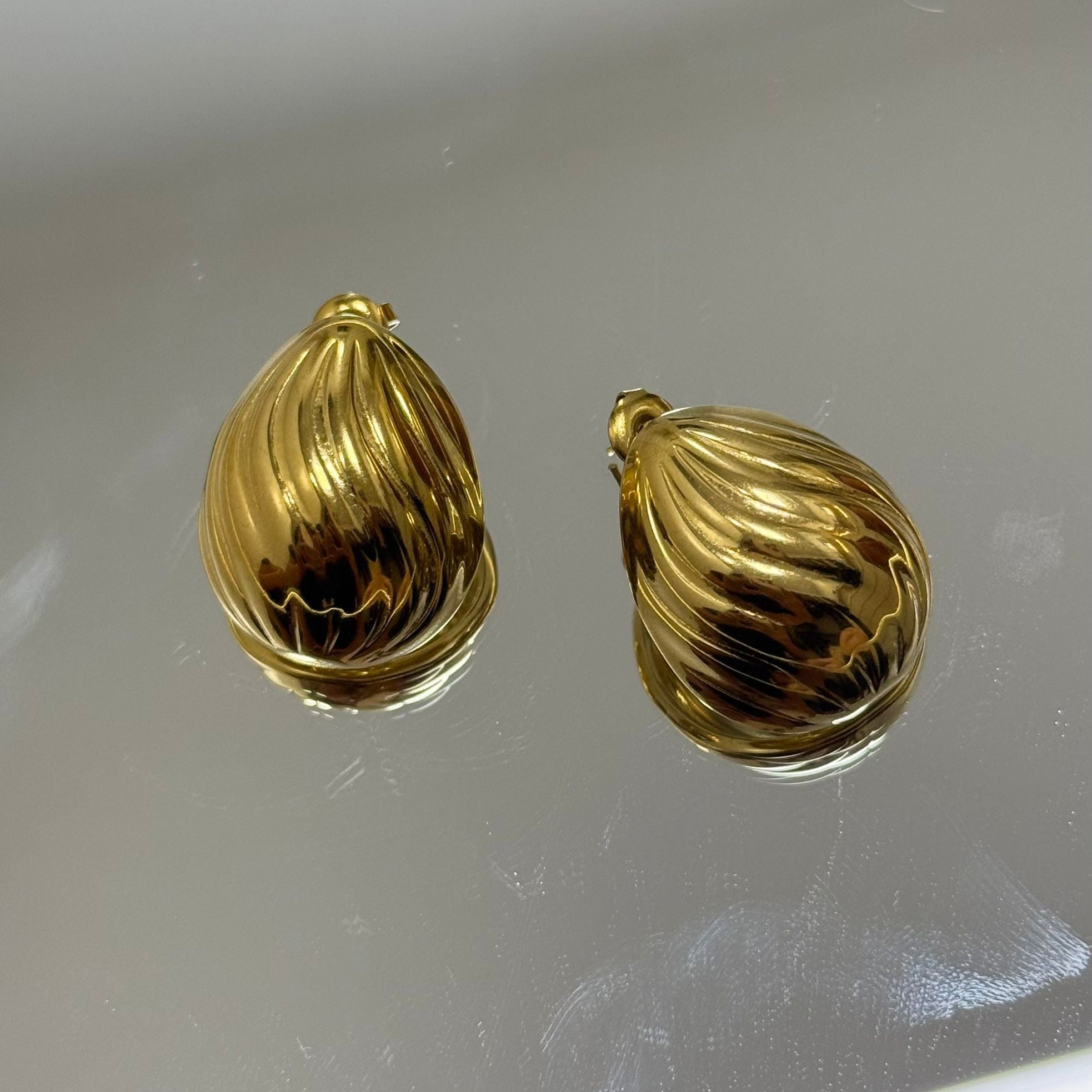 BRINCOS GOLDEN SHELL